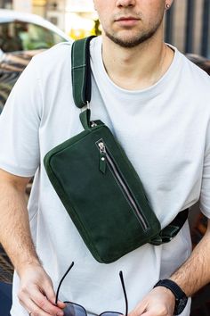 Crossbody Bag 'Vault Green', Leather Shoulder Bag, Chest Bag, Leather Sling Bag, Travel Port, Small Rucksack, Slim Phone Bag, Green Satchel ∎ Genuine leather ∎ Italian accessories ∎ Leather strap ∎ One main zipped compartment ∎ Two side pockets with zipper ∎ One zipped pocket inside ∎ Height: 29 cm / 11.4 in, ∎ Length: 19 cm/ 7.5 in This handmade genuine leather bag is made from traditional leather. The bag has much compartments for easy storage and organization of your personal belongings. The Green Chest Bag With Zipper For Everyday Use, Green Chest Bag For Everyday Use, Green Chest Bag With Removable Pouch For Travel, Everyday Green Chest Bag With Adjustable Strap, Leather Backpack With Cell Phone Pocket, Green Travel Chest Bag With Removable Pouch, Green Leather Duffle Bag For Everyday Use, Green Satchel Belt Bag For Travel, Everyday Use Green Leather Duffle Bag