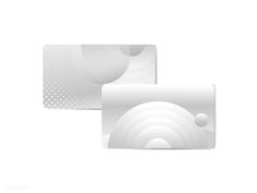 two white business cards sitting side by side on top of each other with circles and dots