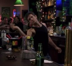 a group of people sitting at a bar