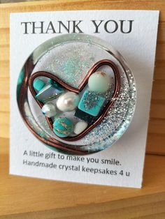 a thank card with an image of a heart in the shape of a handmade crystal keeps