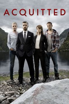 a movie poster with three people standing in front of a body of water and the words,