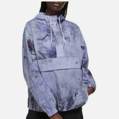 Nike Women's Water Repellent Anorak Pullover Oversized Jacket Size: Small Color: Blue Wave Tie Dye Elastic Cuffs Draw Cords At Hood Mesh Lining In Upper Back Front Pocket With Zipper Closure 100% Nylon New With Tags Fall Windbreaker With Drawstring Hood And Half-zip, Nylon Half-zip Windbreaker For Fall, Fall Nylon Half-zip Windbreaker, Nike Blue Nylon Windbreaker, Nike Half-zip Fall Outerwear, Nike Fall Half-zip Outerwear, Nike Nylon Windbreaker For Fall, Nike Windbreaker For Fall Outdoor Activities, Nike Windbreaker For Outdoor Activities In Fall