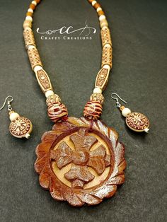 🌿 Elevate Your Style with Handcrafted Wooden Elegance! 🌿 Discover the perfect blend of nature's charm and artisan craftsmanship with our exquisite Artisan Crafted Wooden Necklace and Earrings Set. Meticulously designed and handcrafted, this jewelry ensemble embodies the beauty of sustainable materials and artistic expertise. 🌟 Key Features: 🌸 One-of-a-kind Design: Each necklace and earring is uniquely crafted, ensuring that you possess a piece of wearable art that's unlike any other. 🌸 Natu Jewelry Sets Handmade, Wooden Necklace, Wood Necklace, Necklace And Earrings Set, Ethnic Jewelry, Necklace And Earrings, Artisan Craft, Handmade Wood, Sustainable Materials