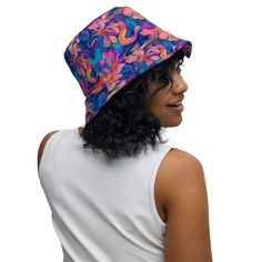 Elevate your festival and outdoor experience with our Trendy Bucket Hat - the ultimate accessory for those sunny, music-filled days! Perfect for festivals, concerts, raves, and all your outdoor adventures, this hat blends style and functionality effortlessly. Its on-trend design ensures you stand out in the crowd, while the wide brim provides shade and protection from the sun. Lightweight and comfortable, it's an ideal companion for dancing, exploring, or simply soaking up the vibrant atmosphere. Don this hat to make a statement and stay cool in warm weather - because fashion should never compromise on fun! Comes in two different sizes, Small and Large Pink Bucket Hat, Custom Bucket Hats, Floral Bucket Hat, Festival Girls, Rave Accessories, Rave Clothing, Reversible Bucket Hat, Hat Custom, Festival Clothing