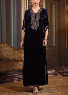 Featuring an Black velvet One Piece Kaftan with Embroidery with handcrafted as and wherever is required of zardosi, cutdana, resham, sequins,dabka embroidery, floral butti & scallop motif embellishment & gota work.  For collection visit --  https://www.indberry.com This product will be shipped to you after 1-2 weeks from the date of order placed. All custom made orders are not returnable. Pls contact for Size chart and for other more colors Request You :To provide contact details for courier services. {VARIATION MAY COME ,IF ANY LACES OR GOTTA PATI or TUSSELS IS USED } NOTE:  1) Visual Samples on website may differ slightly from actual product due to light & effects during photography (Length & Breadth have 1 n 1.5 inches +/-). 2) Before placing order ,pls confirm product n color availabil Velvet One Piece, Dabka Embroidery, Kurta Patterns, Blue Kurta, Gota Work, Beaded Neckline, Embroidery Floral, Thread Embroidery, Velvet Color