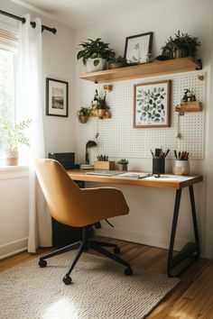 a home office with plants and pictures on the wall