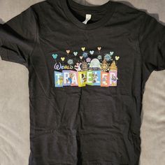 I Bought This Large Kids Shirt For Myself. Never Worn. Because It Was Black And I Didn't Want To Wear It In The Florida Humidity. Brand New, But Handmade So No Tags. Smoke Free Home. Black Disney T-shirt For Disney Trips, Black Pre-shrunk T-shirt For Disney Trips, Black Themed T-shirt For Disney Trips, Graphic Tee For Disney Trips In Black, Black Graphic Tee For Disney Trips, Black T-shirt With Letter Print For Disney Trips, Disney Black T-shirt With Character Print, Black Graphic Print Top For Disney Trips, Black Disney Character Print T-shirt