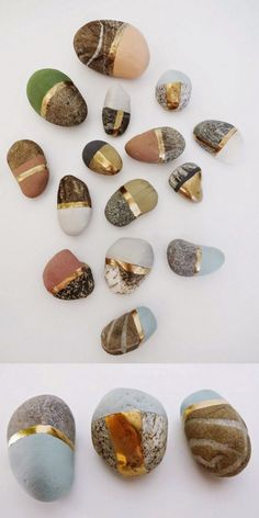 several different colored rocks with gold foil on them