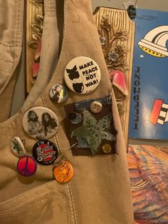 Cushion Something, Vest And Tshirt Outfits, Pins On Bag, Child Of Apollo Aesthetic, Bag With Pins, Child Of Apollo, Bag Pins Aesthetic, Apollo Aesthetic, Apollo Cabin