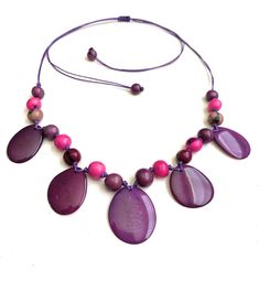 Taua Nut Necklace Necklace Length: 32 inches adjustable to shorter length Eco Friendly Necklace, Tagua Necklace, Ivory Necklace, Tagua Jewelry, Tagua Nuts, Seed Pods, Purple And Green, Bib Necklace, Adjustable Necklace