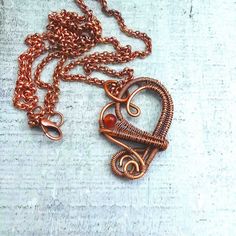 Carnelian Heart Necklace, wire wrap copper pendant, unique stone jewelry, 7th anniversary gift for wife, natural gemstone, gift for women by RockyRoadJewelry on Etsy Handmade Copper Heart Pendant Necklace, Handmade Copper Heart Necklaces, Handmade Copper Heart Pendant Jewelry, Handmade Heart-shaped Copper Necklaces, Handmade Heart-shaped Copper Necklace, Orange Copper, 7th Anniversary Gifts, Copper Heart, Anniversary Gift For Wife