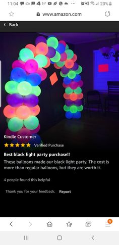 the amazon app shows an image of a colorful arch made out of balloons and lights