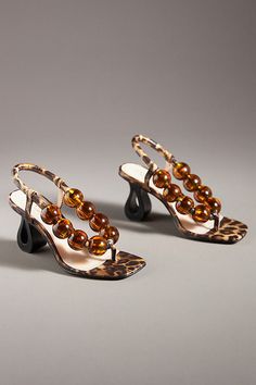 Take a walk on the stylish side with prints so wild you won’t want to miss out. | Calico Beaded Heels by Cecelia New York, Women's, Size: 6, Leather/Rubber at Anthropologie Beaded Heels, Bold Heels, Mule Heels, Funky Shoes, Exclusive Clothing, Girly Shoes, Shoe Inspo, Aesthetic Shoes, Take A Walk