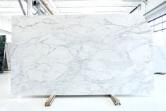 a large white marble slab in a warehouse