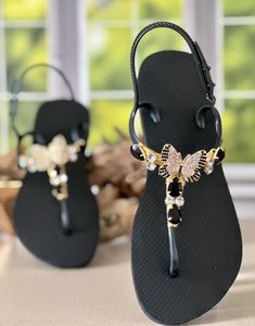 Get ready to fall in love with this elegant design. Our sandals are beloved for their timeless style and exceptional comfort.The glamorous brazilian rhinestone is carefully wrapped to the straps with the most perfect and soft silk yarn. Now you can elevate your look without sacrificing comfort.Each piece is carefully designed and impeccably handmade with the finest brazillian materials.Have a handmade look with a touch of glam. Elegant Adjustable Slingback Sandals For Evening, Luxury Embellished Summer Sandals, Chic Embellished Sandals With Single Toe Strap, Elegant Adjustable Slingback Sandals With Single Toe Strap, Adjustable Toe Post Sandals For Party, Adjustable Evening Sandals, Elegant Black Flip Flops For Vacation, Elegant Ankle Strap Sandals For Vacation, Elegant Toe Post Sandals With Removable Insole