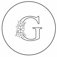 the letter g with flowers on it is shown in black and white, as well as an