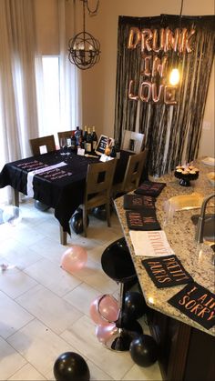 a party room with black and pink decorations