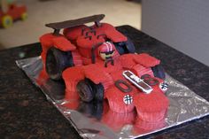 a birthday cake made to look like a race car