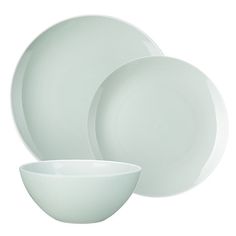 white dinnerware set on a white background