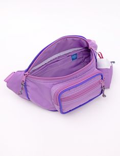 Our Fanny Sling is the cross body bag you've been waiting for! This silhouette hugs your body in all the right places and is the perfect medium size that will hold your necessities without weighing you down. Features super soft nylon webbing, piping details, color buckle, a padded exterior for extra comfort and insulation, 3 separate zipper compartments, and two additional pockets in the main compartment. Coordinating paracord pulls make opening this bag a cinch! Comes with a matching Mokuyobi M Sporty Nylon Chest Bag For Travel, Daily Use Nylon Chest Bag With Functional Pockets, Sporty Nylon Chest Bag With Functional Pockets, Nylon Chest Bag With Functional Pockets For Daily Use, School Nylon Belt Bag With Zipper Pocket, Nylon Shoulder Bag With Functional Pockets For School, Functional Nylon Chest Bag, Nylon Crossbody Belt Bag For School, Nylon Belt Bag With Adjustable Strap For School