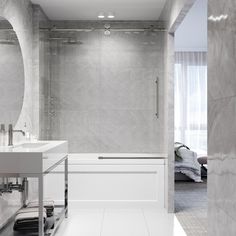 a bathroom with a sink, mirror and bathtub