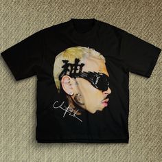 CHRIS BROWN 11 11 Tour T-Shirt | High Quality | Vintage Hip Hop Music Retro Style 90s Tee This shirt is crafted from 6 oz. of 100% USA-grown cotton, offering a premium and durable build across all our standard colors. For a slight variation, our Heather Grey option blends 90% USA cotton with 10% polyester, ensuring a soft touch with a hint of stretch. Additionally, the Charcoal Grey, Safety Green, and Lime variants present a perfect 50/50 mix of USA cotton and polyester, combining comfort with r Retro Style 90s, 90s Tees, Vintage Hip Hop, Hip Hop Style, Retro Mode, Big Face, Style T Shirt, Chris Brown, Hip Hop Music