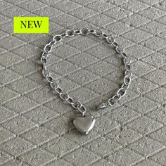 We love stainless steel jewelry! It can look sleek, punky and also lend itself to a hippyish aesthetic.▪️▪️▪️PRODUCTWomen Solid Heart Charm Cable Chain Bracelet316L surgical stainless steel Never Fade and HypoallergenicCare instructions: avoid contact with liquids (water, perfume, beauty products) wipe dry with a soft cloth.***VISIT STORE FOR MORE PRODUCT***🔗 https://www.etsy.com/ca/shop/TWISTEEL▪️▪️▪️ S H I P P I N G  All orders will be shipped on the next business day. UNITED STATES  - USPS F Stainless Steel Heart Bracelets For Everyday, Everyday Stainless Steel Heart Bracelet With Charm, Trendy Metal Bracelets With Heart Charm, Minimalist Metal Heart Bracelet As Gift, Stainless Steel Heart Charm Bracelet For Friendship, Trendy Metal Heart Bracelet As A Gift, Everyday Stainless Steel Bracelet With Heart Charm, Minimalist Metal Bracelets For Valentine's Day, Silver Stainless Steel Heart Bracelet For Friendship