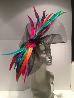 Multi color Fascinator- Large Brim- Breeders Cup- Wedding Fascinator- Cocktail Hat - Kentucky Derby- Horse Races Hello, Have fun walking into your next party/event wearing this big bright stunning fascinator. It will definitely be a head turner! This feather fascinator is about 20 inches round. It has feathers scattered It is center....it's attached to a skinny adjustable headband that is wrapped in satin and is very comfortable. ------------------------------------------------- I ship US Postal Fitted Fascinator For Carnival And Evening, Fitted Headpieces For Evening Carnival, Party Mini Hats With Feathers, Multicolor Feathered Fascinator For Kentucky Derby, Multicolor Feather Fascinator For Kentucky Derby, Multicolor Costume Hats For Royal Ascot Races, Multicolor Costume Hats And Headpieces For Royal Ascot, Multicolor Kentucky Derby Headpiece, Fitted Multicolor Party Hat