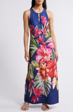 A luscious garden defines this summery maxi dress designed with built-in SPF to keep it fun in the sun plus wrinkle-resistance to make it a travel fave. 52" length Back keyhole with tie closure Scoop neck Sleeveless, with cutaway shoulders UPF 30+ sun protection 95% recycled polyester, 5% spandex Machine wash, tumble dry Imported Tropical Print Dress For Garden Party Vacation, Floral Print Maxi Dress For Garden Party Vacation, Casual Tropical Print Maxi Dress For Garden Party, Multicolor Floral Print Maxi Dress For Summer Outings, Vibrant Print Sleeveless Vacation Dress, Casual Maxi Dress With Tropical Print For Garden Party, Sleeveless Vacation Maxi Dress For Garden Party, Tropical Dresses For Garden Party Vacation, Sleeveless Maxi Dress For Garden Party Vacation