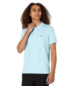 Refine your look this summer with the Lacoste Short Sleeve Jersey Interlock. Its soft cotton knit keeps you cool in the heat while the classic polo fit flatters your form. Signature crocodile logo embroidery and two-button placket detail this casual wardrobe essential. At under $100, it's the versatile piece that elevates any outfit with timeless Lacoste style. Fitted Casual Polo Shirt With Spread Collar, Classic Fitted Collared Polo Shirt, Classic Fitted Polo Shirt With Ribbed Collar, Fitted Cotton Polo Shirt With Ribbed Collar, Casual Slim Fit Top With Fold Down Collar, Fitted Cotton Polo Shirt With Fold Down Collar, Fitted Short Sleeve Polo Shirt With Ribbed Collar, Fitted Cotton Polo Shirt With Collar, Classic Fitted Polo Shirt With Spread Collar