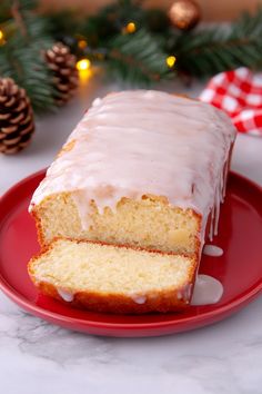 a loaf of pound cake on a red plate