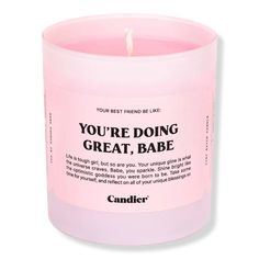 a pink candle that reads i'm dreaming of a pink christmas