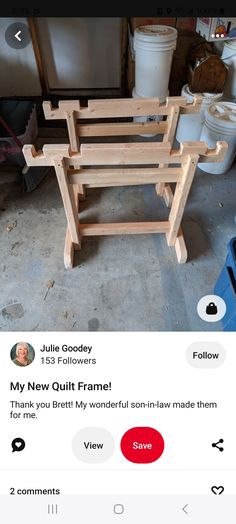 a wooden bench sitting on top of a cement floor