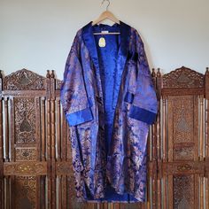 Beautiful Deadstock Embroidered, Likely Silk, Blue Robe Created In Hangzhou, China. Dark, Shiny Sapphire Blue Interior And Cuffs. The Outer Shows A Traditional Asian Water Scene With Trees, Buildings, And People On Boats In A Dual-Toned Red And Gold Embroidered Thread. It's A Heavy And Lovely Garment To Hold. Tag Is Still Attached. In Very Good, Unused Condition With Only Faint Marks On One Cuff From Storage (I Had To Tilt The Sleeve In The Light For The Marks To Show Up On Camera; They're Extre Traditional Long Sleeve Blue Robe, Blue Kimono, Sleepwear Robe, Blue Interior, Kimono Fashion, Red And Gold, Women's Intimates, Vintage Ladies, Long Sleeve