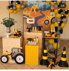 a construction themed party with balloons and decorations