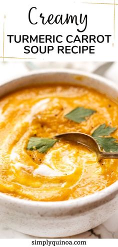 creamy turmeric carrot soup recipe in a white bowl with a spoon on top