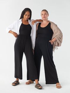 The Hana Jumpsuit is the ultimate done-in-one outfit. With its compressive bodice, high wasted culotte pant, and deep side seam pockets, it’s designed to be effortlessly elegant while simultaneously maximizing your comfort level. Wear it as is to a dance class, or to walk to the park. Or layer it with your favorite little cardigan and a hat to head out for the day. And its versatility doesn’t stop there — you can rock it with your favorite comfy heels for a night out. We aren’t exaggerating when Versatile Wide Leg Jumpsuit Or Romper, Fitted Wide Leg Jumpsuits For Loungewear, Rachel Pally, Culotte Pants, Cashmere Wrap, Guess By Marciano, Athleisure Outfits, Jumpsuit With Sleeves, Wrap Cardigan