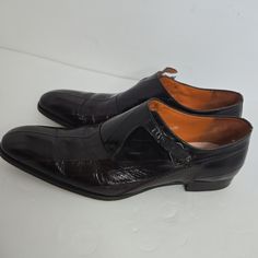 Elevate Your Formal Footwear Collection With These Mezlan "Orleans" Brown Dress Shoes. Crafted From Genuine Eel Skin Leather, These Shoes Exude Sophistication And Style. The Monkstrap Design And Shine Calf Add A Touch Of Elegance, Perfect For Any Formal Occasion. These Shoes Are Ideal For Men Who Appreciate Quality And Timeless Design. The Us Shoe Size 13m Fits True To Size, Ensuring A Comfortable And Secure Fit. The Beautiful Brown Color Complements Any Outfit, Making These Shoes A Versatile Ad Designer Monk Strap Slip-on Shoes For Semi-formal Occasions, Designer Monk Strap Shoes With Leather Sole, Luxury Fitted Monk Strap Shoes With Leather Sole, Formal Patent Leather Monk Strap Shoes With Leather Sole, Formal Monk Strap Shoes With Patent Leather, Designer Formal Monk Strap Shoes With Leather Lining, Designer Semi-formal Slip-on Monk Strap Shoes, Designer Monk Strap Shoes Goodyear Welted For Formal Occasions, Designer Goodyear Welted Monk Strap Shoes For Formal Occasions