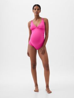 Soft, stretch maternity one-piece swimsuit.  V-neck.  Tank straps at front, strappy details at back.  Certain styles have allover prints.  This one-piece is made with 83% recycled polyester.  Less waste in the world.  More great swimsuits for you.  Please note: Maternity styles cannot be returned in store.  Please enjoy free returns by mail.  Choose your maternity Pink Swimwear With Upf 50+ Stretch, Pink Ladies Outfit, Maternity One Piece Swimsuit, Pink One-piece Nylon Swimwear, Pink V-neck One-piece Beachwear, Pink 4-way Stretch Sporty Swimwear, Maternity One Piece, Maternity Styles, Gap Maternity