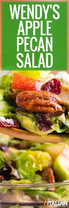 a salad with apples, lettuce and cranberries on it in a glass bowl