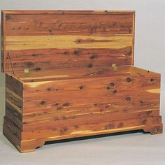 a large wooden box sitting on top of a white background