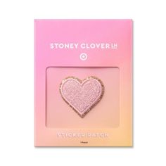 a pink and gold heart shaped sticker on a white background with the words stoney clover