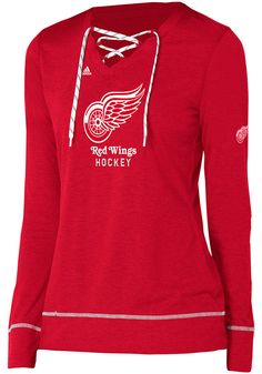 Display your Detroit Red Wings spirit in this Detroit Red T-Shirt! Featuring a screen print graphic, contrast stitching, and skate lace detailing, this Detroit Red Wings Long Sleeve V-Neck is a must-have for any fan. Go Red Wings! V neckline with skate lace detailing, Contrast color stitching, Distressed screen print team graphics, 65% POLYESTER / 35% COTTON Lace Long Sleeve Top, Women's Hockey, Detroit Red Wings Hockey, Red Wings Hockey, Go Red, Lace Top Long Sleeve, Detroit Red Wings, Red Adidas, Red T