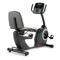 an exercise bike is shown with the monitor on it's arm and seat up