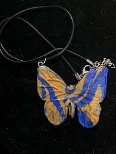 Introducing our Handcrafted Resin Butterfly Pendants, the perfect addition to any jewelry collection. Each pendant is carefully crafted and features stunning glitter designs that catch the light beautifully. These pendants are truly one-of-a-kind, with no two pieces being exactly the same. Choose from a variety of designs of marbled polymer clay monarch butterfly. These pendants make a unique and thoughtful gift for any occasion. If there are specific colors you would like to see or you would li Hand Painted Butterfly Jewelry Gift, Unique Hand Painted Butterfly Jewelry, Hand Painted Butterfly Jewelry For Gift, Multicolor Butterfly Print Jewelry Gift, Polymer Clay Butterfly, Clay Butterfly, Marbled Polymer Clay, Butterfly Necklaces, Resin Butterfly