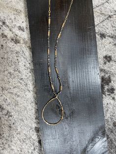 Gold chain with grey colored beads Hammered gold teardrop 2" teardrop 31" long with a 2.5" extender Hammered Gold, Teardrop Necklace, Gold Chain, Gold Chains, Gold Necklace, Beads, Chain, Grey, Gold