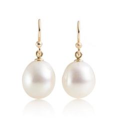 These elegant 14-karat yellow gold earrings are embellished with luminous freshwater cultured pearls. Revered for their alluring luster and classic beauty, pearls are widely recognized as symbols of purity, integrity and wisdom gained through experience. Pierced only. Overall: 1"L. Pearl Teardrop Earrings, Jewelry Pearls, Fine Jewelery, Yellow Gold Earrings, White Freshwater Pearl, Pearl Set, Freshwater Cultured Pearls, Yellow Gold Earring, Lovely Jewellery