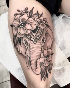 Elephant Tattoos for Women: Unique, Pretty, and Feminine Designs for Arm, Thigh, and More Lion Tattoo On Thigh, Elephant Thigh Tattoo, Butterfly Thigh Tattoo, Elephant Tattoo Meaning, Cute Elephant Tattoo, Elephant Tattoo Design, Ring Finger Tattoos, Omerta Tattoo