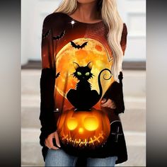 Halloween Cat Print Crew Neck T-Shirt, Casual Long Sleeve T-Shirt For Halloween 100% Polyester Crew Neck Medium Stretch Long Sleeves Black Cat With Green Eyes! Super Cute Top 2-3 Day Priority Mail Shipping Usps Spooky Orange Crew Neck Top, Orange Halloween Tops With Character Print, Orange Crew Neck Top For Halloween, Spooky Cat Design Tops For Fall, Black Character Print Top For Fall, Black Tops With Character Print For Fall, Orange Tops With Character Print For Fall, Fall Orange Tops With Character Print, Orange Character Print Tops For Fall