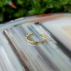 Ear Cuff, conch cuff, ear wrap, ear band, 14K solid yellow gold  1.8mm wide ear cuff. No piercing required! Measures: 0.5"   13mm width 1.8mm (Available in a smaller size upon request, please convo me) The perfect gift for you or your loved ones.Follow us on:Instagram @sampsonjewelryFacebook @sampsonjewelryPinterest @sampsonjewelryTweet on Twitter @sampsonjewelryTo save for later, click Add Item to FavoriteWith any questions or comments feel free to convo me. Thank you for shopping with Sampson Adjustable Gold Stackable Earrings, Stackable Yellow Gold Earrings, Adjustable Yellow Gold Stackable Earrings, Adjustable 14k Yellow Gold Ear Cuff, Adjustable Stackable Yellow Gold Earrings, Adjustable Gold Stackable Cartilage Earrings, Adjustable Stackable Gold Cartilage Earrings, Adjustable Gold Cartilage Earrings For Wedding, Adjustable 14k Gold Ear Cuff